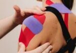 Young,Woman,With,Thin,,Stretchy,Tapes,On,Her,Neck,And